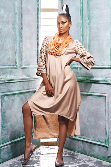 Front view of an asymmetric hem kurta style dress.