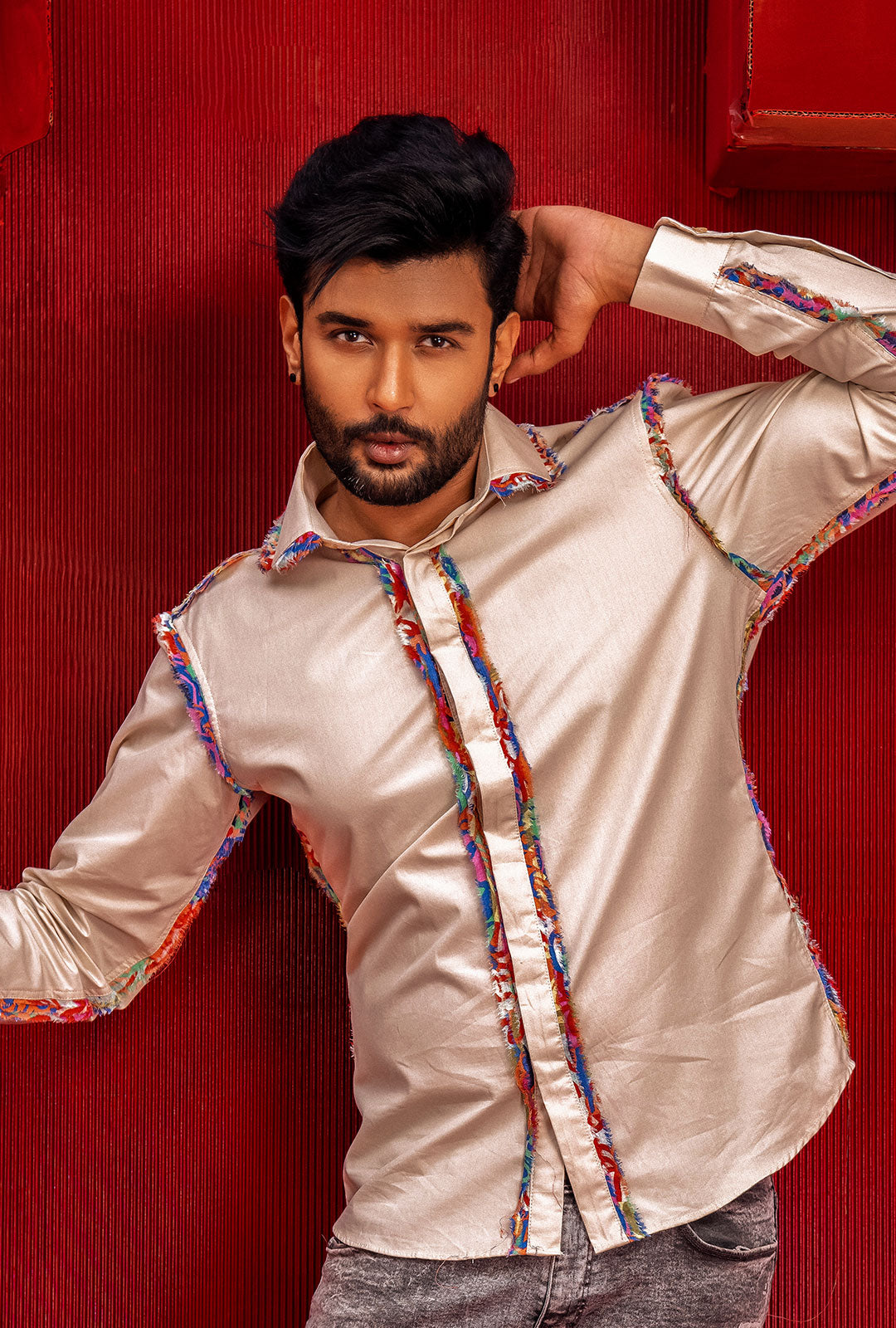 Front view of a beige shirt with fray detail on seams.