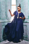 Midnight blue dress with hemline cascade sleeve.