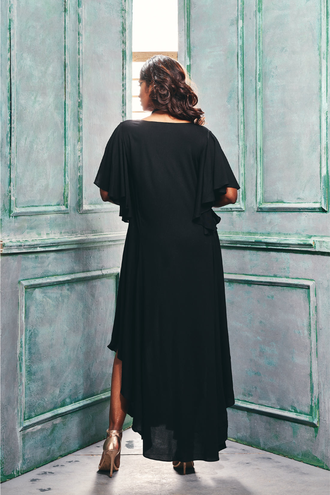 Front view of the dress With Asymmetrical Hemline & Cascade Sleeve.