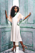 Front view of the dress with multi-color cascade sleeves.