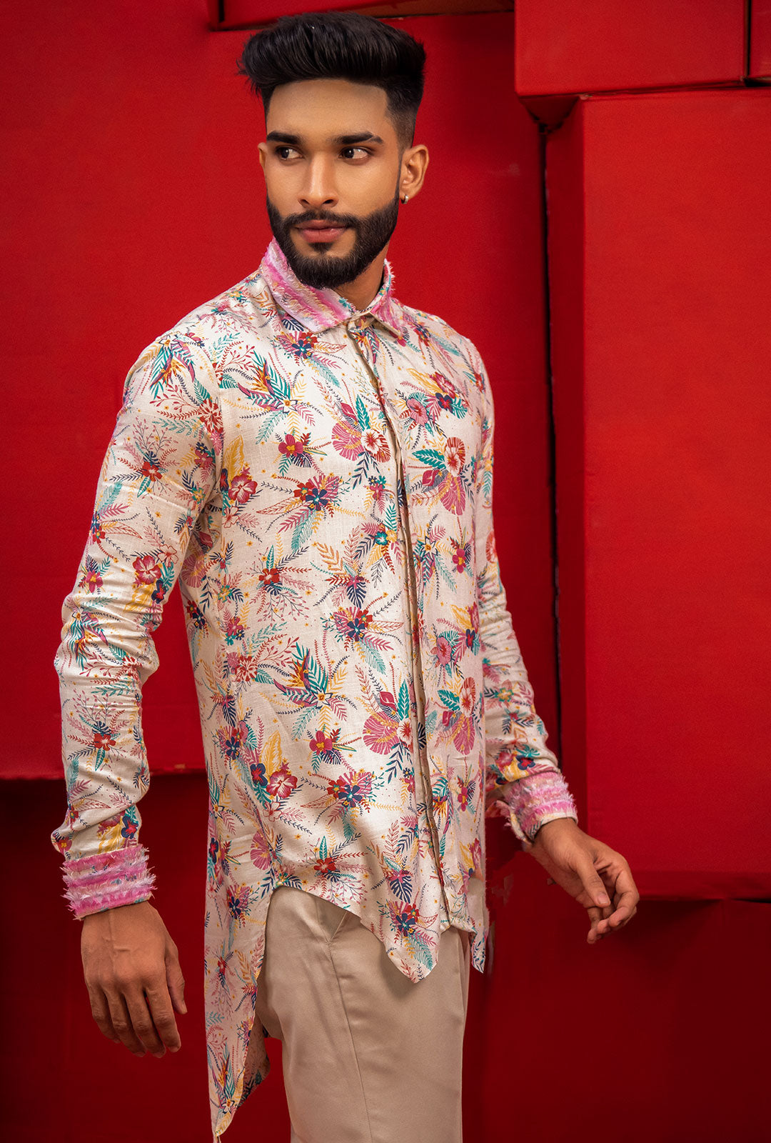 A printed asymmetrical shirt with frayed collar & cuff.