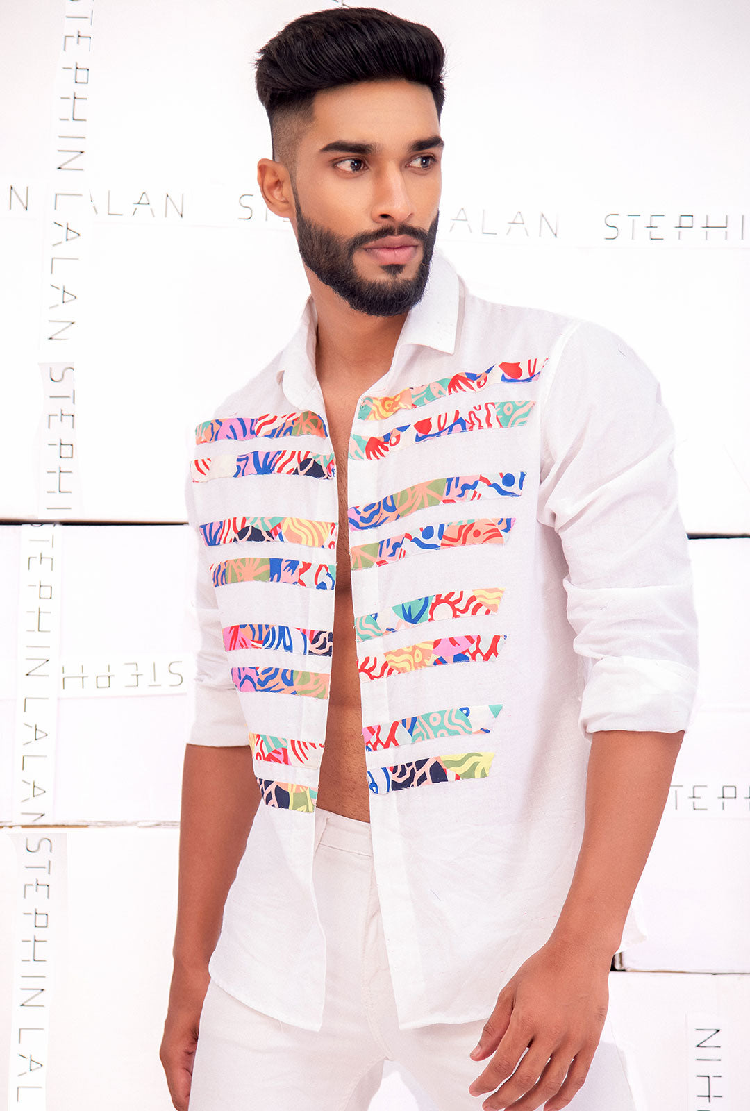 Front view of an offwhite shirt with stripe patchwork.