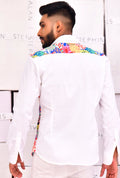 Back view of a white shirt with printed detailing.