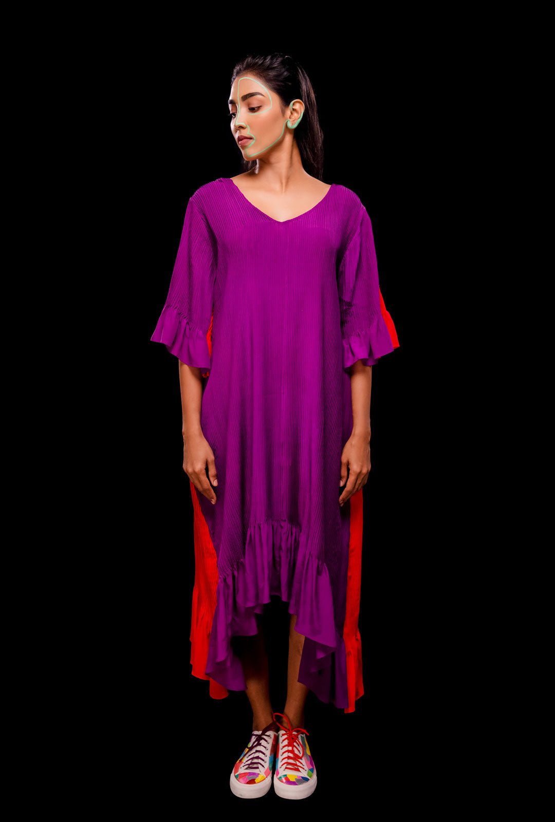 Front view of a reversible asymmetric dress.