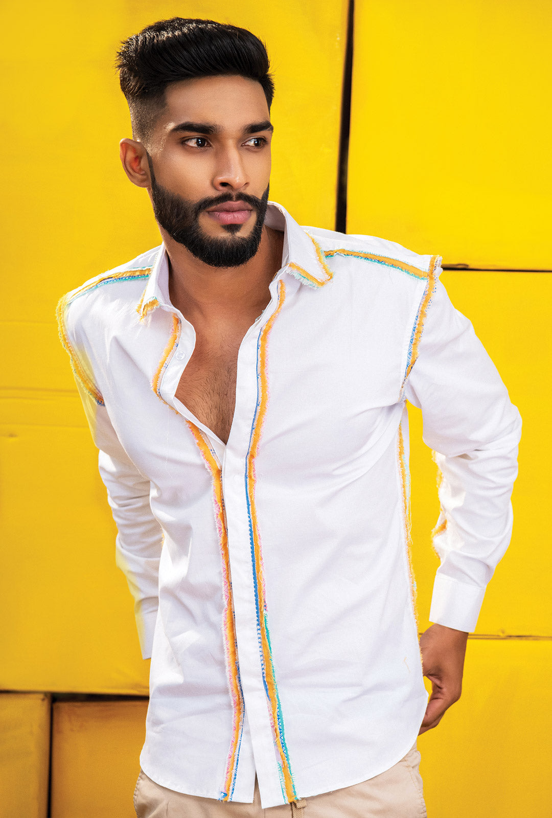Front view of a white shirt with fray detail on seams.