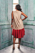 Back view of the beige & red color Sleeveless Flapper Style Dress With a Flared Hem.