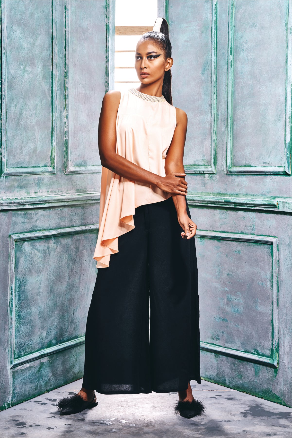 Sleeveless Top With Asymmetric Ruffle Hem