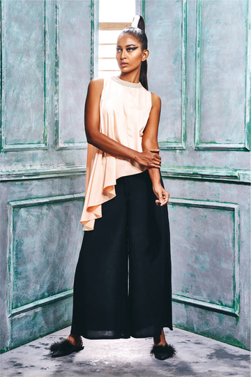 Sleeveless Top With Asymmetric Ruffle Hem