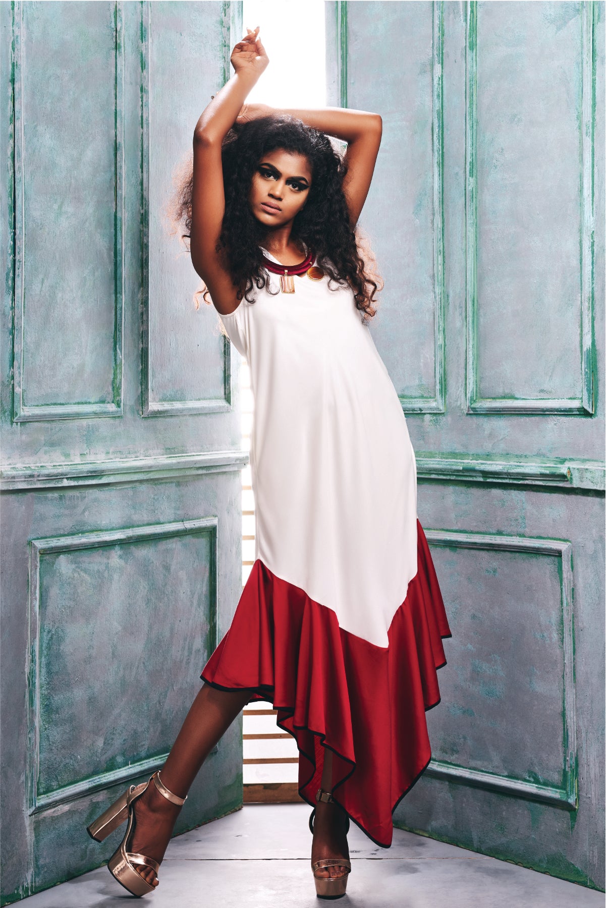 Front view of the sleeveless Tunic Dress With an Asymmetric Hem.