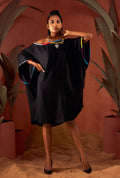 Front view of a black color solid tunic.