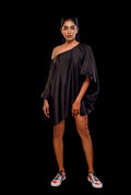Front view of a black color solid tunic.