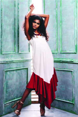 Front view of the sleeveless Tunic Dress With an Asymmetric Hem.