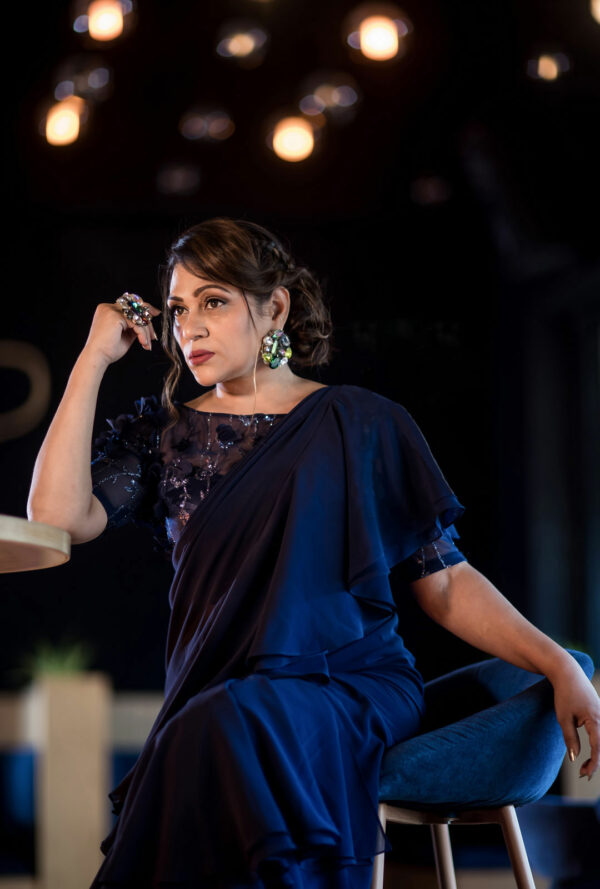 A model wearing a Midnight Blue Ruffle Saree.