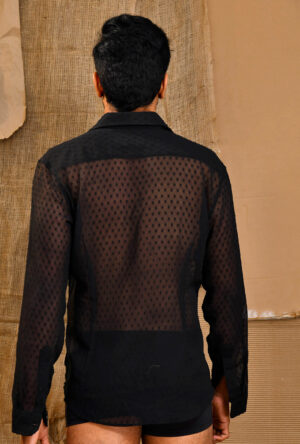 Back view of a paneled brasso shirt in black.