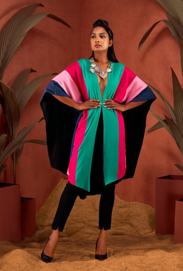 Front view of a color-blocked poncho.