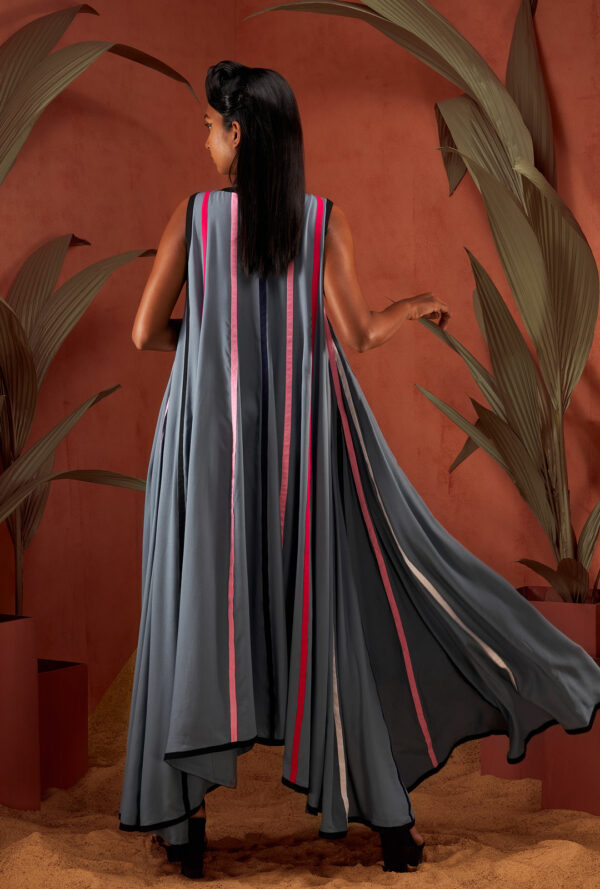 Back view of a grey color paneled multi-hue strip sleeveless dress.