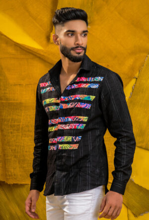 Front view of a black shirt with stripe patchwork.