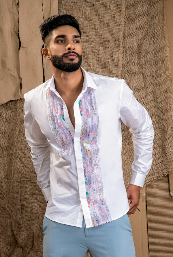 Front view of a white shirt with asymmetrical fray panel.